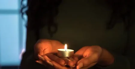 holding candle